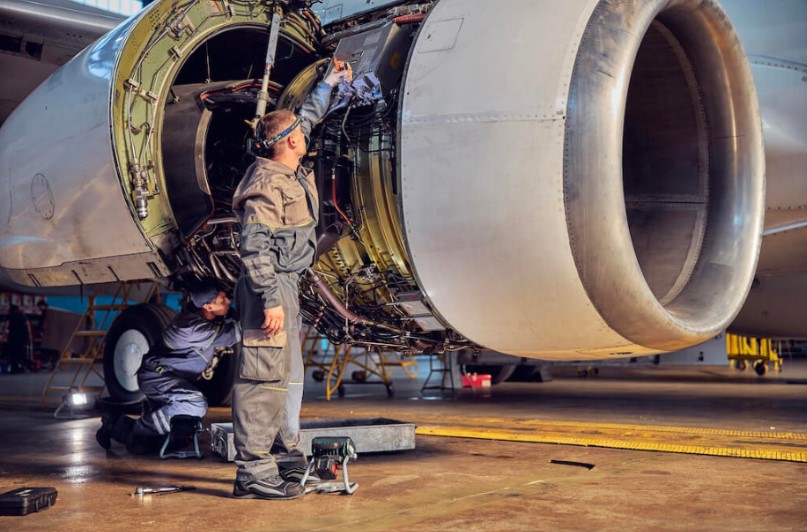 An image of maintenance repairs being done to an aircraft.