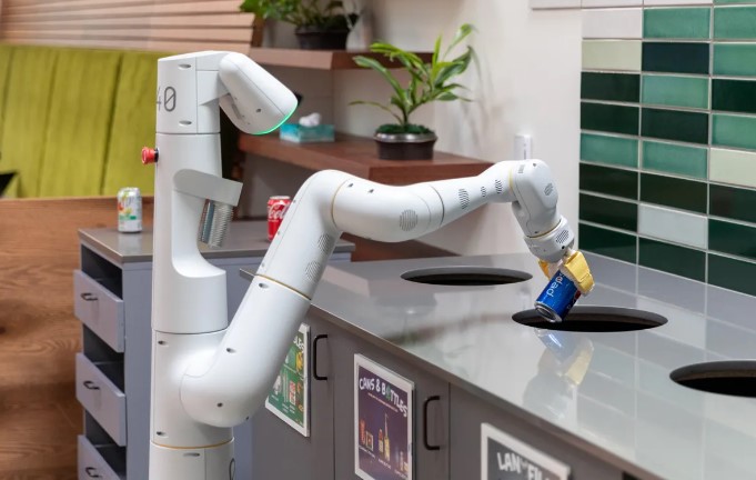 Google’s PaLM-SayCan Robot recycling a soda can.