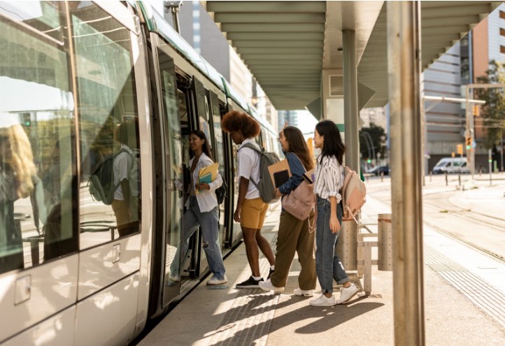 Passengers entering a metro train.